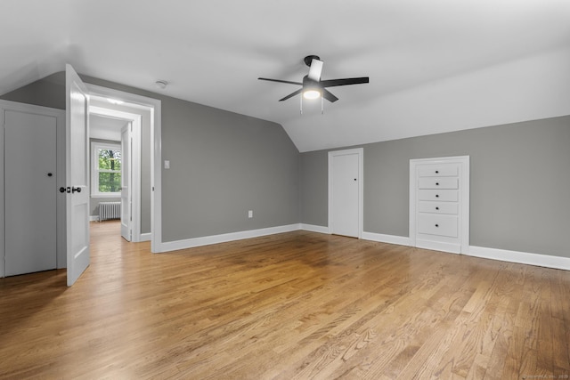 291 Maple Hill Rd, Naugatuck, CT 06770 - bonus room featuring lofted ceiling, radiator, ceiling fan, light wood finished floors, and baseboards