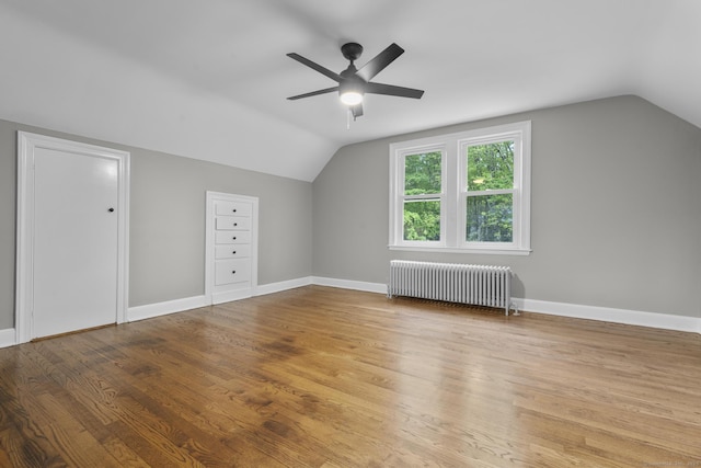 291 Maple Hill Rd, Naugatuck, CT 06770 - additional living space featuring radiator, lofted ceiling, ceiling fan, wood finished floors, and baseboards