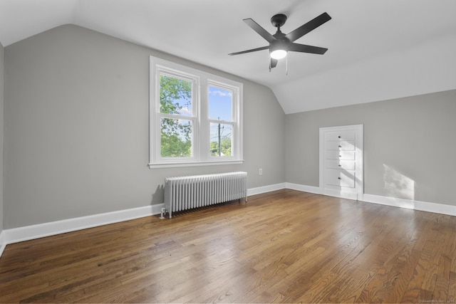 291 Maple Hill Rd, Naugatuck, CT 06770 - additional living space featuring radiator heating unit, lofted ceiling, ceiling fan, wood finished floors, and baseboards