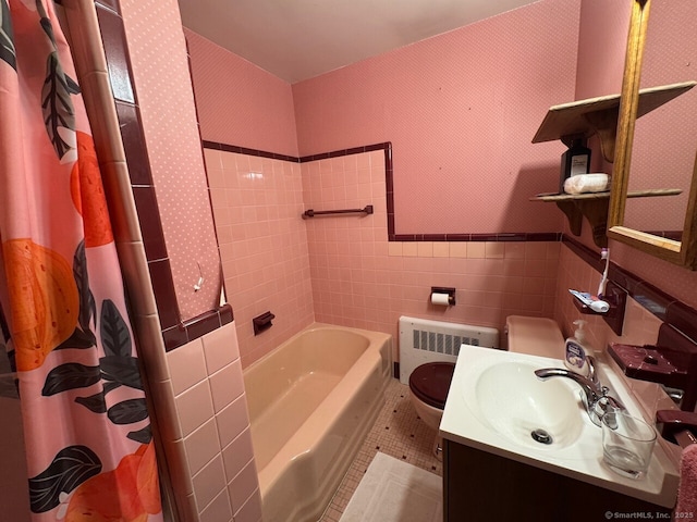 48 Bailey St, Trumbull, CT 06611 - full bathroom featuring radiator, tile walls, toilet, vanity, and wallpapered walls