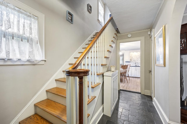8 Usher Ave, Plainville, CT 06062 - stairs with stone tile flooring and baseboards