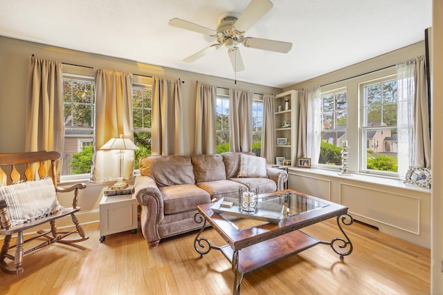8 Usher Ave, Plainville, CT 06062 - living area featuring ceiling fan and light wood-style flooring