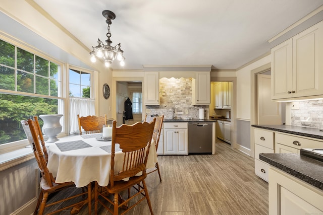 8 Usher Ave, Plainville, CT 06062 - dining area with a chandelier and baseboards