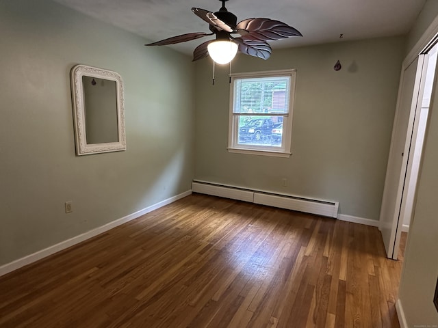 331 Pond Hill Rd, Plainfield, CT 06354 - unfurnished room featuring baseboard heating, wood finished floors, baseboards, and a ceiling fan