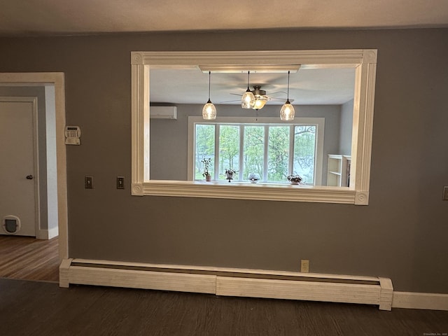 331 Pond Hill Rd, Plainfield, CT 06354 - unfurnished dining area featuring baseboards, an AC wall unit, baseboard heating, and wood finished floors
