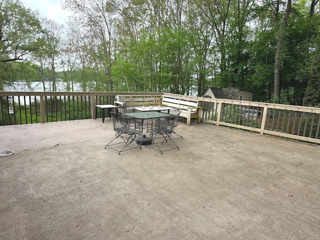 331 Pond Hill Rd, Plainfield, CT 06354 - view of patio featuring outdoor dining area, a storage shed, an outdoor structure, and a deck with water view