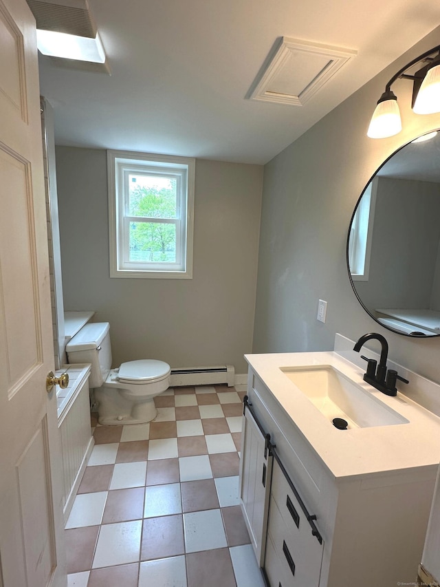 331 Pond Hill Rd, Plainfield, CT 06354 - bathroom with a baseboard heating unit, toilet, vanity, and tile patterned floors