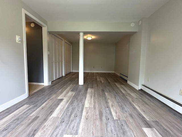 331 Pond Hill Rd, Plainfield, CT 06354 - unfurnished room featuring a baseboard heating unit, wood finished floors, and baseboards