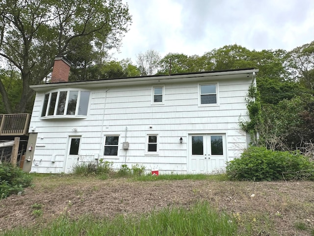 331 Pond Hill Rd, Plainfield, CT 06354 - rear view of house featuring a chimney