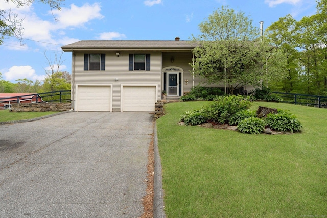 232 Bailey Hill Rd, Killingly, CT 06239 - split foyer home with asphalt driveway and a garage