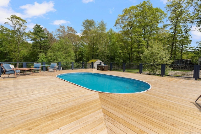 232 Bailey Hill Rd, Killingly, CT 06239 - view of swimming pool featuring a deck and view of wooded area