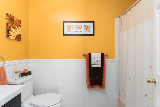 232 Bailey Hill Rd, Killingly, CT 06239 - full bathroom featuring wainscoting, toilet, and vanity