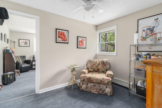 232 Bailey Hill Rd, Killingly, CT 06239 - living area with a baseboard radiator, carpet flooring, a ceiling fan, a textured ceiling, and baseboards