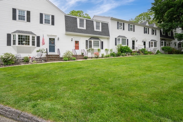 5 Bridgewater Cmn Unit 5, Bridgewater, CT 06752 - view of front of property featuring a shingled roof, a front yard, and entry steps