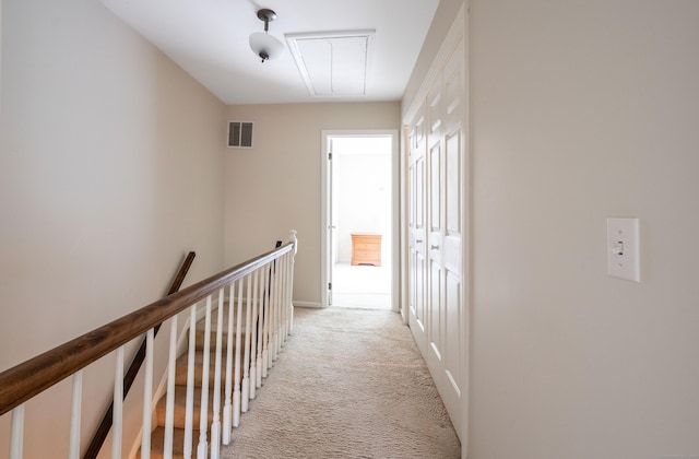 5 Bridgewater Cmn Unit 5, Bridgewater, CT 06752 - hall with attic access, light carpet, an upstairs landing, and baseboards
