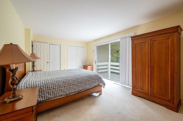 5 Bridgewater Cmn Unit 5, Bridgewater, CT 06752 - bedroom with access to exterior, two closets, and light colored carpet