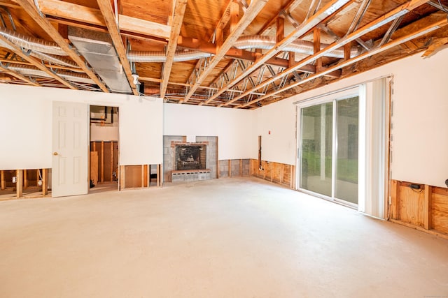5 Bridgewater Cmn Unit 5, Bridgewater, CT 06752 - basement featuring a fireplace and a wainscoted wall