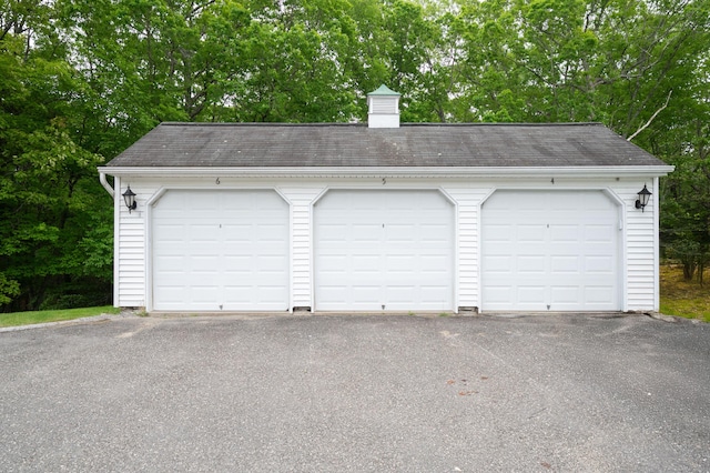 5 Bridgewater Cmn Unit 5, Bridgewater, CT 06752 - garage with view of scattered trees