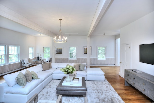 481 Ridgefield Rd, Wilton, CT 06897 - living room with wood finished floors, a chandelier, beam ceiling, a baseboard heating unit, and wainscoting