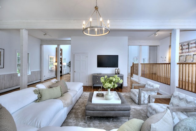 481 Ridgefield Rd, Wilton, CT 06897 - living area with beamed ceiling, a chandelier, track lighting, and wood finished floors