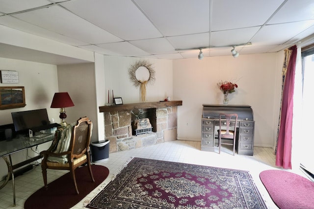 880 Long Hill Rd Unit 880, Middletown, CT 06457 - home office with a drop ceiling, a stone fireplace, and tile patterned floors