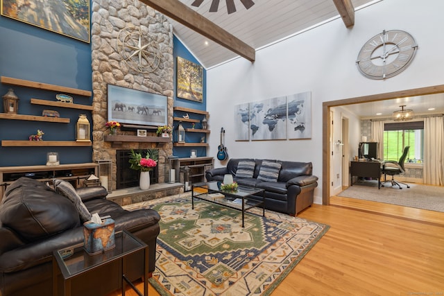 23 Blackhaw Dr, Cromwell, CT 06416 - living area featuring a desk, beamed ceiling, wood finished floors, a stone fireplace, and high vaulted ceiling