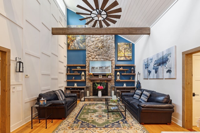 23 Blackhaw Dr, Cromwell, CT 06416 - living area featuring light wood finished floors, a ceiling fan, beamed ceiling, high vaulted ceiling, and baseboards