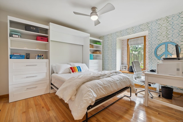 23 Blackhaw Dr, Cromwell, CT 06416 - bedroom featuring wallpapered walls, light wood finished floors, an office area, baseboards, and ceiling fan