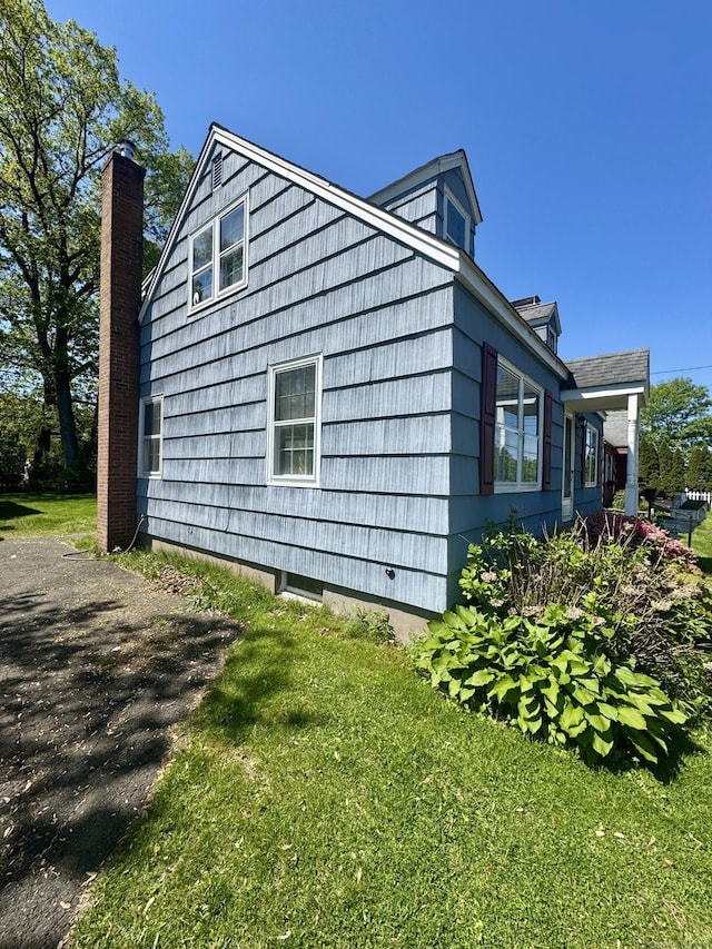 710 Middle Tpke W, Manchester, CT 06040 - view of property exterior featuring a lawn