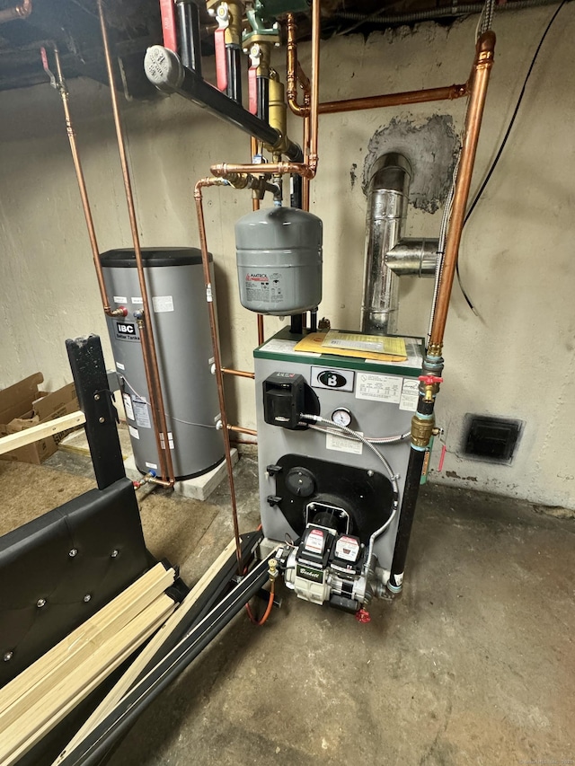 710 Middle Tpke W, Manchester, CT 06040 - utility room with water heater and a heating unit