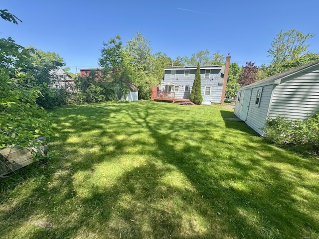 710 Middle Tpke W, Manchester, CT 06040 - view of grassy yard with a deck
