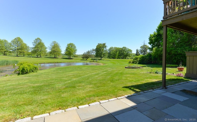 419 Heritage Vlg Unit B, Southbury, CT 06488 - view of grassy yard featuring a water view