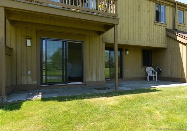 419 Heritage Vlg Unit B, Southbury, CT 06488 - entrance to property with a patio, a yard, and a balcony