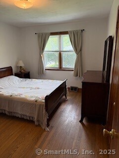 153 Barton St, Torrington, CT 06790 - bedroom featuring wood finished floors