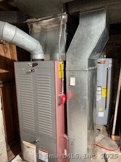 153 Barton St, Torrington, CT 06790 - utility room featuring water heater