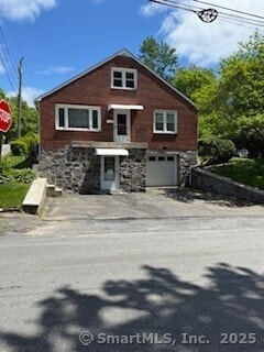 153 Barton St, Torrington, CT 06790 - view of front of property with driveway and an attached garage