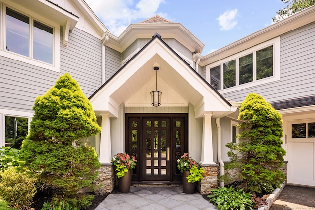 166 Long Lots Rd, Westport, CT 06880 - doorway to property with stone siding