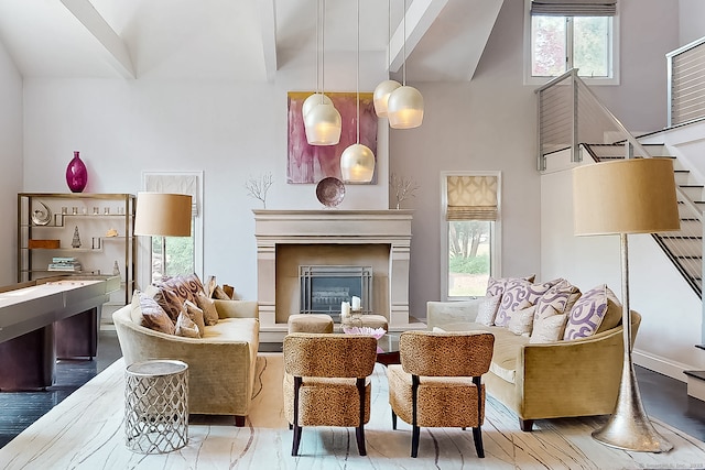 166 Long Lots Rd, Westport, CT 06880 - living area featuring a towering ceiling and a fireplace with raised hearth