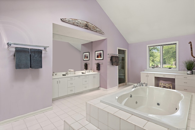 166 Long Lots Rd, Westport, CT 06880 - full bath with vaulted ceiling, a jetted tub, double vanity, and tile patterned floors