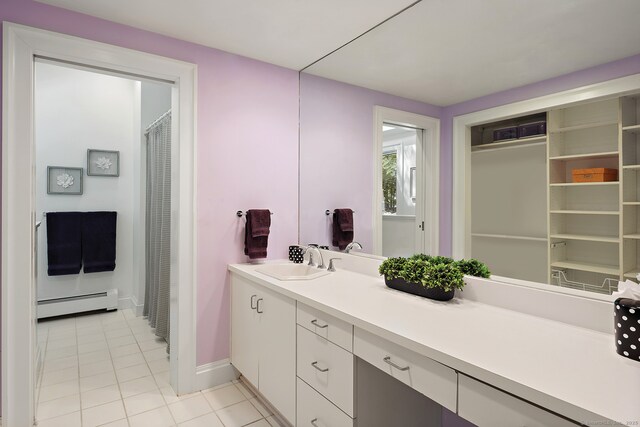 166 Long Lots Rd, Westport, CT 06880 - bathroom with baseboard heating, tile patterned flooring, and vanity