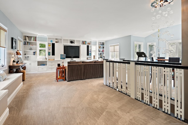 166 Long Lots Rd, Westport, CT 06880 - carpeted living area featuring a chandelier