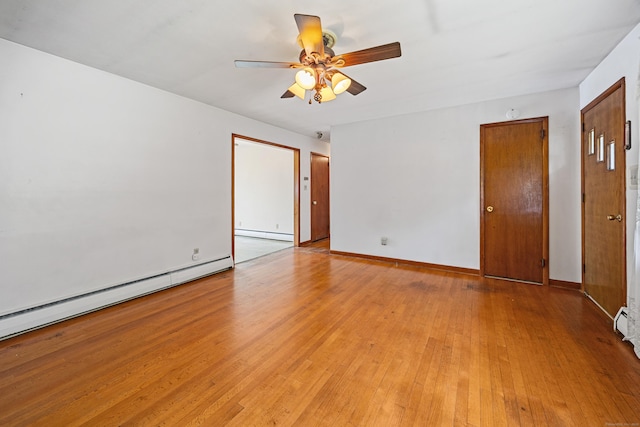 413 Hickory Hill Rd, Thomaston, CT 06787 - empty room with a baseboard heating unit, ceiling fan, light wood finished floors, and baseboards
