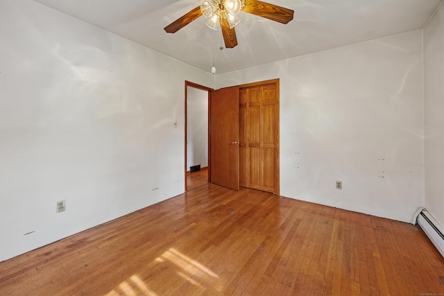 413 Hickory Hill Rd, Thomaston, CT 06787 - empty room featuring ceiling fan, light wood-type flooring, and a baseboard heating unit