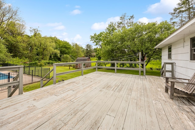 413 Hickory Hill Rd, Thomaston, CT 06787 - wooden deck featuring view of wooded area and a lawn