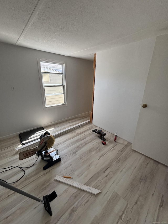 1012 Old Colony Rd Lot 85, Meriden, CT 06451 - empty room featuring wood finished floors and a textured ceiling