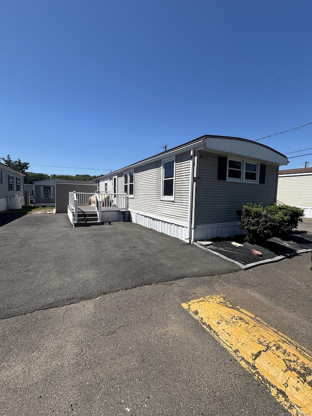 1012 Old Colony Rd Lot 85, Meriden, CT 06451 - manufactured / mobile home with a deck