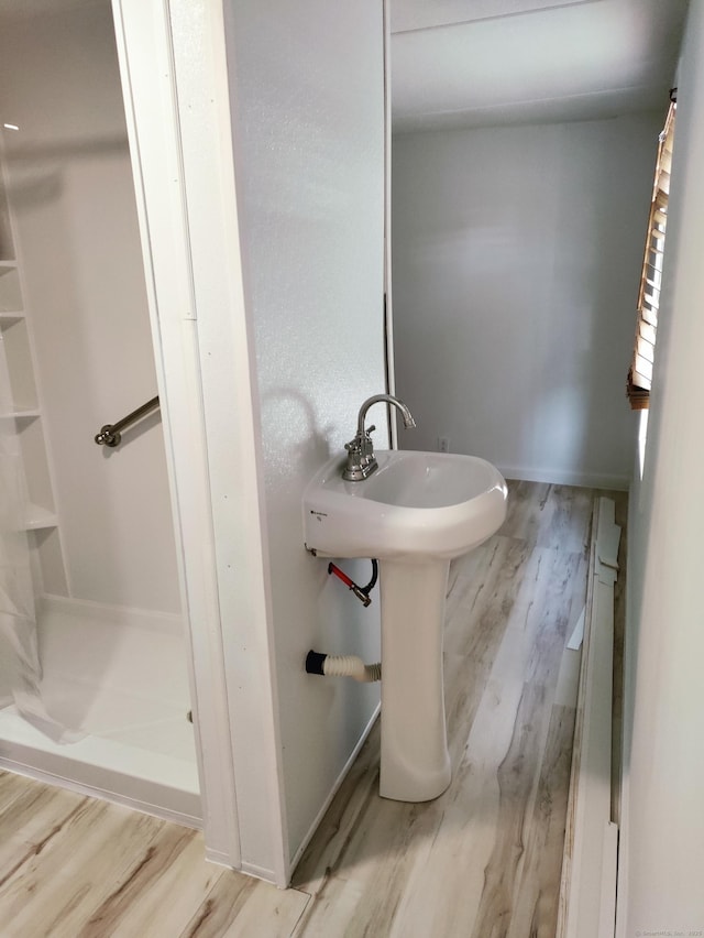 1012 Old Colony Rd Lot 85, Meriden, CT 06451 - bathroom with wood finished floors and a stall shower