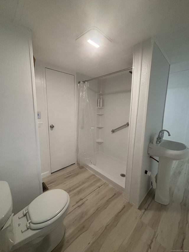 1012 Old Colony Rd Lot 85, Meriden, CT 06451 - full bath with wood finished floors and a shower stall