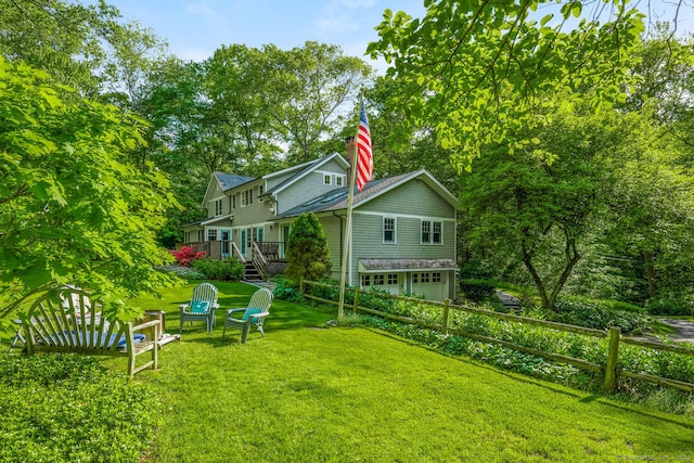 66 Saunders Dr, Wilton, CT 06897 - view of yard featuring a garage and a deck