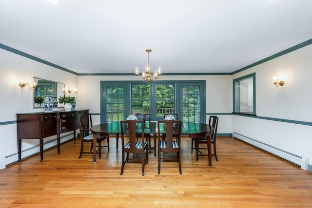 66 Saunders Dr, Wilton, CT 06897 - dining space with a baseboard radiator, ornamental molding, a chandelier, and wood finished floors